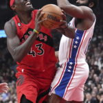 
              Toronto Raptors' Pascal Siakam, left, looks to shoot against Philadelphia 76ers' James Harden during first-half NBA basketball game action in Toronto, Friday, Oct. 28, 2022. (Chris Young/The Canadian Press via AP)
            