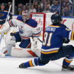 
              St. Louis Blues' Vladimir Tarasenko (91) is unable to get off a shot as Edmonton Oilers goaltender Stuart Skinner (74) defends during the second period of an NHL hockey game Wednesday, Oct. 26, 2022, in St. Louis. (AP Photo/Jeff Roberson)
            