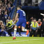 
              Chelsea's Jorginho runs to celebrate after scoring his side's first goal during the English Premier League soccer match between Manchester United and Chelsea at the Stamford Bridge Stadium in London, Saturday, Oct. 22, 2022. (AP Photo/Frank Augstein)
            