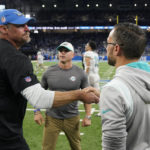 
              Detroit Lions head coach Dan Campbell, left, shakes hands with Miami Dolphins head coach Mike McDaniel after an NFL football game, Sunday, Oct. 30, 2022, in Detroit. (AP Photo/Paul Sancya)
            