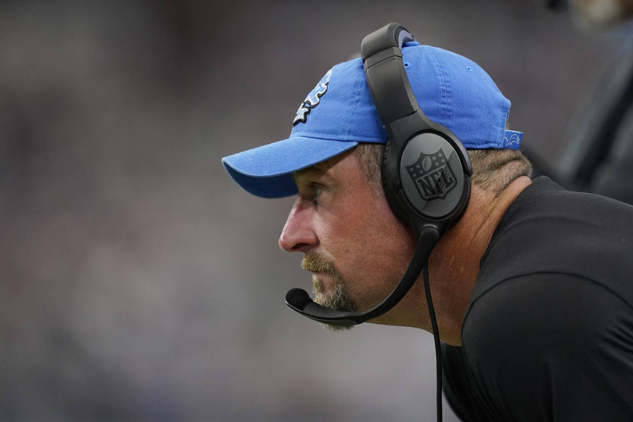 Detroit Lions head coach Dan Campbell watches from the sideline during the first half of an NFL foo...