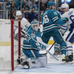 
              San Jose Sharks goaltender Kaapo Kahkonen (36) deflects a shot by the Toronto Maple Leafs during the second period of an NHL hockey game in San Jose, Calif., Thursday, Oct. 27, 2022. (AP Photo/Godofredo A. Vásquez)
            