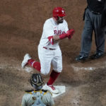 
              Philadelphia Phillies' Kyle Schwarber celebrates his home run during the sixth inning in Game 4 of the baseball NL Championship Series between the San Diego Padres and the Philadelphia Phillies on Saturday, Oct. 22, 2022, in Philadelphia. (AP Photo/Matt Slocum)
            