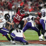 
              Baltimore Ravens place kicker Justin Tucker (9) has a 61-yard field goal attempt blocked as Tampa Bay Buccaneers' Jamel Dean (35) defends during the first half of an NFL football game Thursday, Oct. 27, 2022, in Tampa, Fla. (AP Photo/Chris O'Meara)
            