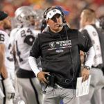 
              Las Vegas Raiders head coach Josh McDaniels watches during the second half of an NFL football game against the Kansas City Chiefs Monday, Oct. 10, 2022, in Kansas City, Mo. The Chiefs won 30-29. (AP Photo/Charlie Riedel)
            
