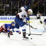 
              Colorado Avalanche right wing Mikko Rantanen controls the puck past New York Rangers defenseman Adam Fox (23) in the third period of an NHL hockey game Tuesday, Oct. 25, 2022, in New York. The Avalanche won 3-2 in a shootout. (AP Photo/Adam Hunger)
            