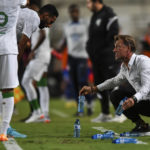 
              FILE - Saudi Arabia's coach Herve Renard talks to a player during the international friendly soccer match between Saudi Arabia and United States in Murcia, Spain, Tuesday, Sept. 27, 2022. (AP Photo/Jose Breton, File)
            