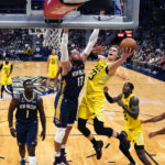 
              Utah Jazz forward Lauri Markkanen (23) goes to the basket against New Orleans Pelicans center Jonas Valanciunas (17) in the first half of an NBA basketball game in New Orleans, Sunday, Oct. 23, 2022. (AP Photo/Gerald Herbert)
            