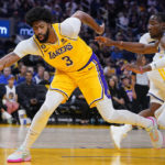 
              Los Angeles Lakers forward Anthony Davis (3) keeps the ball inbound against the Golden State Warriors during the first half of a basketball game in San Francisco, Sunday, Oct. 9, 2022. (AP Photo/Godofredo A. Vásquez)
            