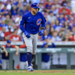 
              Chicago Cubs' P.J. Higgins tosses his bat as he draws an RBI-walk during the sixth inning of a baseball game against the Cincinnati Reds in Cincinnati, Wednesday, Oct. 5, 2022. (AP Photo/Aaron Doster)
            