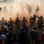 
              Illinois players run onto the field before an NCAA college football game against Minnesota, Saturday, Oct. 15, 2022, in Champaign, Ill. (AP Photo/Charles Rex Arbogast)
            