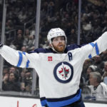 
              Winnipeg Jets center Adam Lowry celebrates his goal during the first period of an NHL hockey game against the Los Angeles Kings Thursday, Oct. 27, 2022, in Los Angeles. (AP Photo/Mark J. Terrill)
            