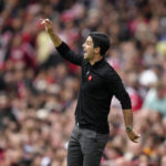 
              Arsenal's manager Mikel Arteta shouts out as gives instructions from the side line during the English Premier League soccer match between Arsenal and Tottenham Hotspur, at Emirates Stadium, in London, England, Saturday, Oct. 1, 2022. (AP Photo/Kirsty Wigglesworth)
            