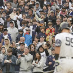 
              Fanns react as New York Yankees' Aaron Judge comes up to bat in the fourth inning of a baseball game against the Baltimore Orioles, Saturday, Oct. 1, 2022, in New York. (AP Photo/Mary Altaffer)
            