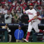 
              Philadelphia Phillies' Kyle Schwarber celebrates his home run during the sixth inning in Game 4 of the baseball NL Championship Series between the San Diego Padres and the Philadelphia Phillies on Saturday, Oct. 22, 2022, in Philadelphia. (AP Photo/Matt Rourke)
            