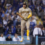
              San Diego Padres' Ha-Seong Kim reacts as he flies out to end Game 1 of a baseball NL Division Series against the Los Angeles Dodgers Tuesday, Oct. 11, 2022, in Los Angeles. (AP Photo/Ashley Landis)
            