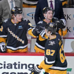 
              Pittsburgh Penguins' Rickard Rakell (67) returns to the bench after scoring against the Los Angeles Kings during the first period of an NHL hockey game in Pittsburgh, Thursday, Oct. 20, 2022. (AP Photo/Gene J. Puskar)
            