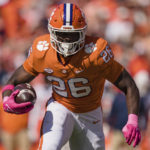 
              Clemson running back Phil Mafah (26) carries the ball in the first half during an NCAA college football game against Syracuse on Saturday, Oct. 22, 2022, in Clemson, S.C. (AP Photo/Jacob Kupferman)
            