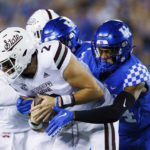
              Kentucky defensive back Carrington Valentine, right, sacks Mississippi State quarterback Will Rogers (2) during the first half of an NCAA college football game in Lexington, Ky., Saturday, Oct. 15, 2022. (AP Photo/Michael Clubb)
            