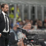 
              FILE - England's coach Gareth Southgate looks out during the UEFA Nations League soccer match between Italy and England at the San Siro stadium, in Milan, Italy, Friday, Sept. 23, 2022. (AP Photo/Antonio Calanni, File)
            