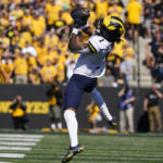 
              Michigan wide receiver Andrel Anthony (1) catches a pass during the first half of an NCAA college football game against Iowa, Saturday, Oct. 1, 2022, in Iowa City, Iowa. (AP Photo/Charlie Neibergall)
            