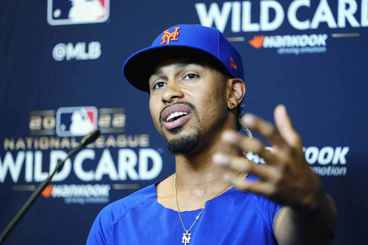 New York Mets' Francisco Lindor speaks during a news conference the day before a wild-card baseball...