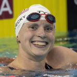 
              Katie Ledecky, of the United States, celebrates after breaking the world record in the 1500-meter freestyle at the FINA Swimming World Cup meet in Toronto on Saturday, Oct. 29, 2022. (Frank Gunn/The Canadian Press via AP)
            
