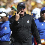 
              Kansas head coach Lance Leipold shouts to a referee in the first half of an NCAA college football game against Baylor, Saturday, Oct. 22, 2022, in Waco, Texas. (AP Photo/Jerry Larson)
            