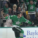
              Dallas Stars center Roope Hintz celebrates after scoring a goal during the first period of an NHL hockey game against the Nashville Predators in Dallas, Saturday, Oct. 15, 2022. (AP Photo/LM Otero)
            