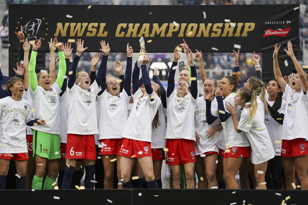 FILE - Washington Spirit players celebrate after defeating Chicago Red Stars in the NWSL Championsh...