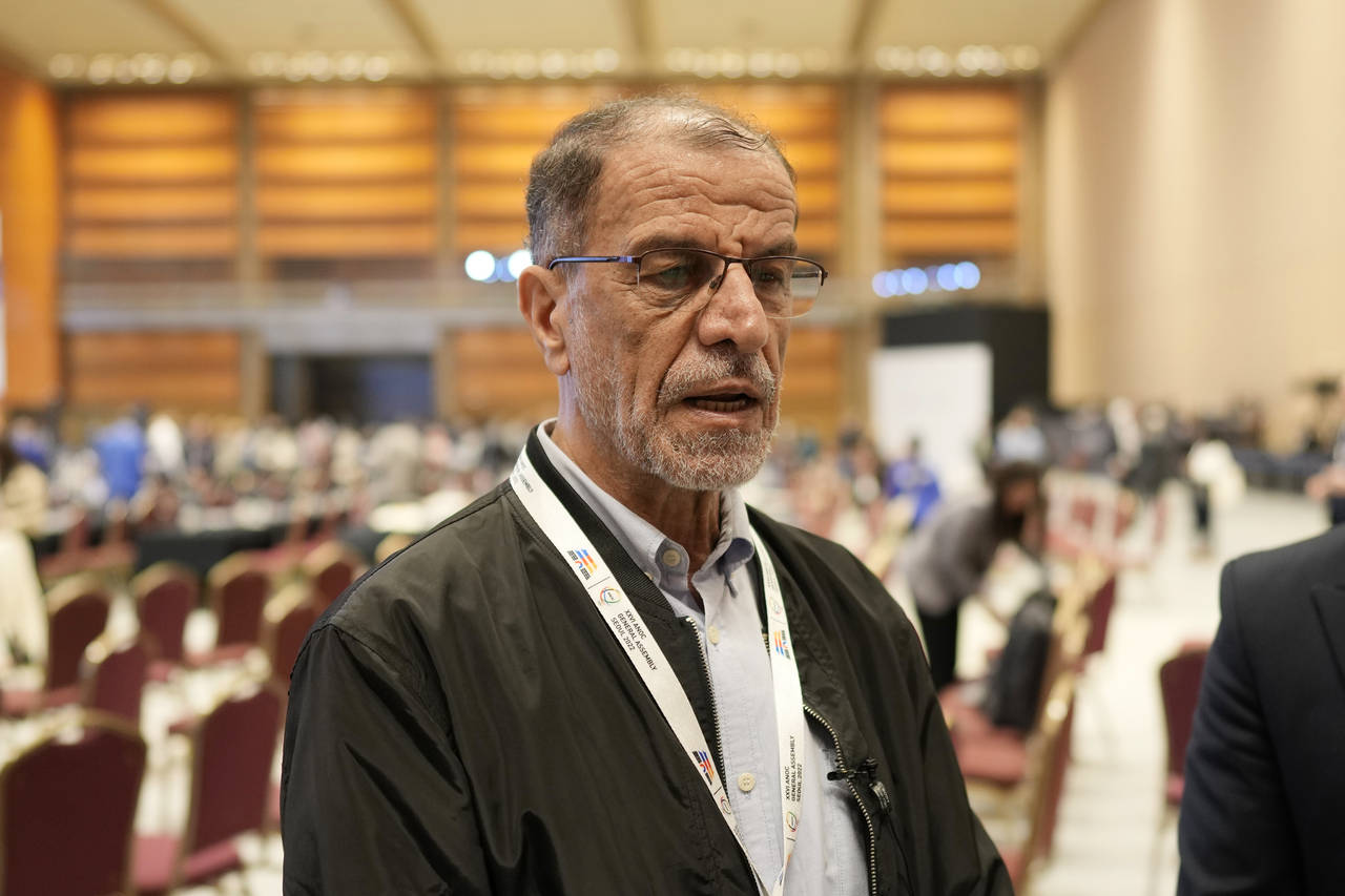 The president of Iran's national Olympic committee (NOC) Mahmoud Khosravi Vafa answers a reporter's...