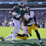 
              Philadelphia Eagles wide receiver A.J. Brown (11) catches a touchdown pass against Pittsburgh Steelers safety Minkah Fitzpatrick (39) and cornerback Ahkello Witherspoon (25) during the first half of an NFL football game between the Pittsburgh Steelers and Philadelphia Eagles, Sunday, Oct. 30, 2022, in Philadelphia. (AP Photo/Derik Hamilton)
            