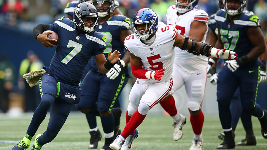 Seahawks' Geno Smith: 12s 'got us a win' helping force eight Panthers false  starts