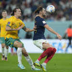 
              Australia's Jackson Irvine, left, challenges for the ball with France's Adrien Rabiot during the World Cup group D soccer match between France and Australia, at the Al Janoub Stadium in Al Wakrah, Qatar, Tuesday, Nov. 22, 2022. (AP Photo/Francisco Seco)
            
