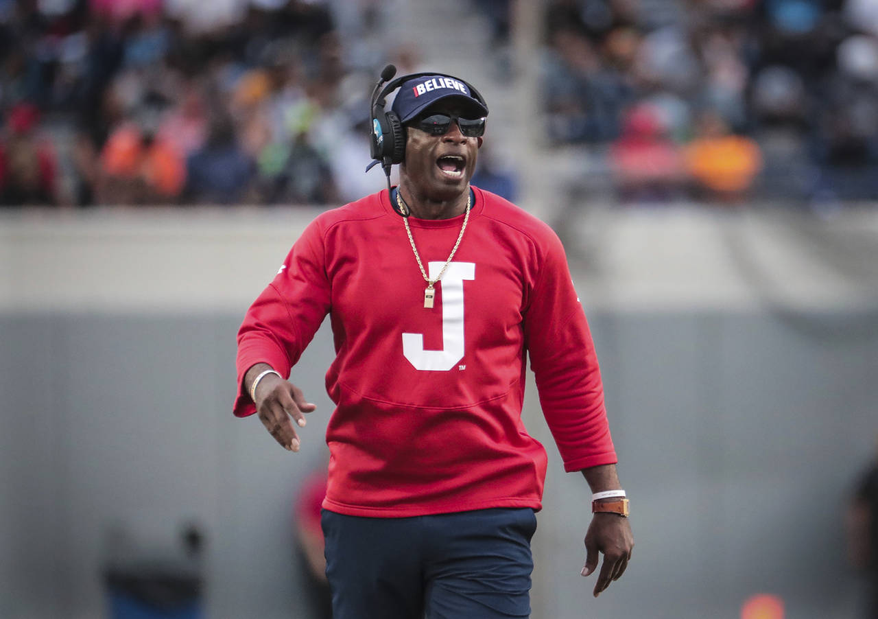 FILE - Jackson State coach Deion Sanders gets his team's attention during the Southern Heritage Cla...