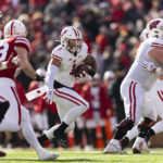 
              Wisconsin's Chez Mellusi carries the ball against Nebraska during the second half of an NCAA college football game, Saturday, Nov. 19, 2022, in Lincoln, Neb. Mellusi led Wisconsin in rushing with 98 yards during their 15-14 win against Nebraska. (AP Photo/Rebecca S. Gratz)
            