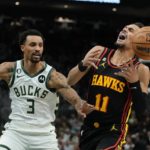 
              Atlanta Hawks' Trae Young loses the ball in front of Milwaukee Bucks' George Hill during the first half of an NBA basketball game Monday, Nov. 14, 2022, in Milwaukee. (AP Photo/Morry Gash)
            