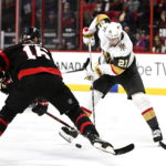 
              Vegas Golden Knights center Brett Howden (21) controls the puck against Ottawa Senators left wing Austin Watson (16) during the first period of an NHL hockey game in Ottawa, Ontario, Thursday, Nov. 3, 2022. (Justin Tang/The Canadian Press via AP)
            