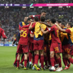 
              Spain players celebrate after Alvaro Morata scored the opening goal during the World Cup group E soccer match between Spain and Germany, at the Al Bayt Stadium in Al Khor , Qatar, Sunday, Nov. 27, 2022. (AP Photo/Matthias Schrader)
            