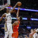 
              New Orleans Pelicans forward Herbert Jones (5) defends a shot by Oklahoma City Thunder forward Jeremiah Robinson-Earl in the first quarter of an NBA basketball game in New Orleans, Monday, Nov. 28, 2022. (AP Photo/Derick Hingle)
            