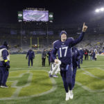 
              Tennessee Titans quarterback Ryan Tannehill (17) celebrates as he leaves the field after the team's NFL football game against the Green Bay Packers Thursday, Nov. 17, 2022, in Green Bay, Wis. (AP Photo/Mike Roemer)
            