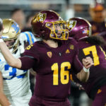 
              Arizona State quarterback Trenton Bourguet (16) throws a pass against UCLA during the first half of an NCAA college football game in Tempe, Ariz., Saturday, Nov. 5, 2022. (AP Photo/Ross D. Franklin)
            