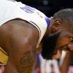 
              Los Angeles Lakers forward LeBron James reacts after scoring during the first half of an NBA basketball game against the Cleveland Cavaliers, Sunday, Nov. 6, 2022, in Los Angeles. (AP Photo/Marcio Jose Sanchez)
            