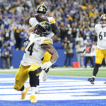 
              Pittsburgh Steelers running back Benny Snell Jr. (24) celebrates a touchdown run during the second half of an NFL football game against the Indianapolis Colts, Monday, Nov. 28, 2022, in Indianapolis. (AP Photo/AJ Mast)
            