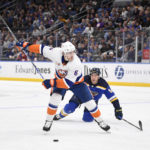 
              New York Islanders' Ryan Pulock (6) looks to shoot against the St. Louis Blues during the third period of an NHL hockey game Thursday, Nov. 3, 2022, in St. Louis. (AP Photo/Jeff Le)
            