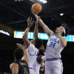 
              UCLA guard Jaime Jaquez Jr. (24) grabs a rebound during the first half of the team's NCAA college basketball game against Sacramento State on Monday, Nov. 7, 2022, in Los Angeles. (AP Photo/Marcio Jose Sanchez)
            