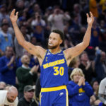 
              Golden State Warriors guard Stephen Curry (30) celebrates after shooting a 3-point basket against the Sacramento Kings during the second half of an NBA basketball game in San Francisco, Monday, Nov. 7, 2022. (AP Photo/Jeff Chiu)
            