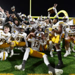 
              Wyoming celebrates after defeating Colorado State in an NCAA college football game Saturday, Nov. 12, 2022, in Fort Collins, Colo. (Andy Cross/The Denver Post via AP)
            