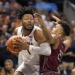 
              Virginia forward Jayden Gardner (1) drives with the ball against North Carolina Central during the first half of an NCAA college basketball game in Charlottesville, Va., Monday, Nov. 7, 2022. (AP Photo/Mike Kropf)
            