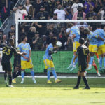
              Los Angeles FC midfielder Kellyn Acosta (23) scores on a free kick the deflected of a Philadelphia Union player in the first half of the MLS Cup soccer match Saturday, Nov. 5, 2022, in Los Angeles. (AP Photo/Marcio Jose Sanchez)
            